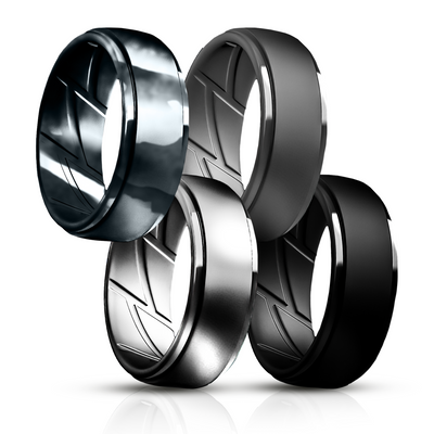 et of four black and silver silicone rings with tree bark texture