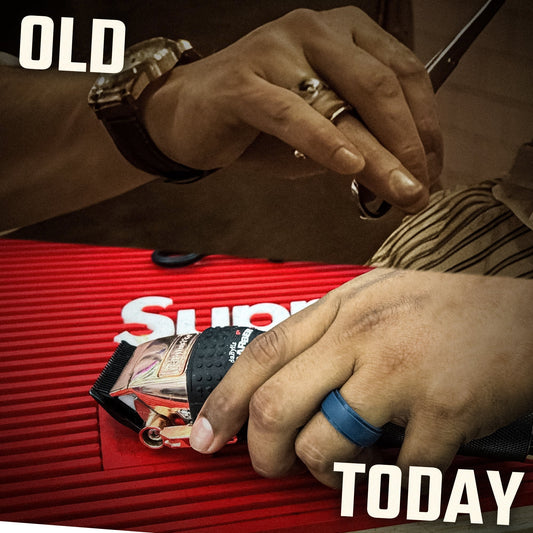 Professional barber using tools while wearing blue silicone ring
