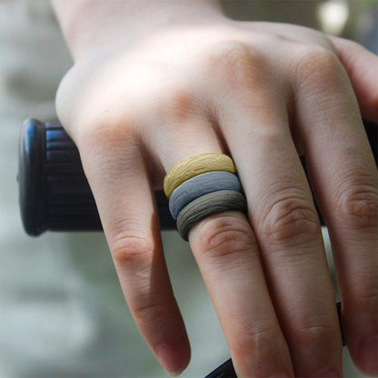Sand pattern silicone rings worn on hand