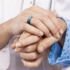 Doctor wearing a blue silicone ring during work