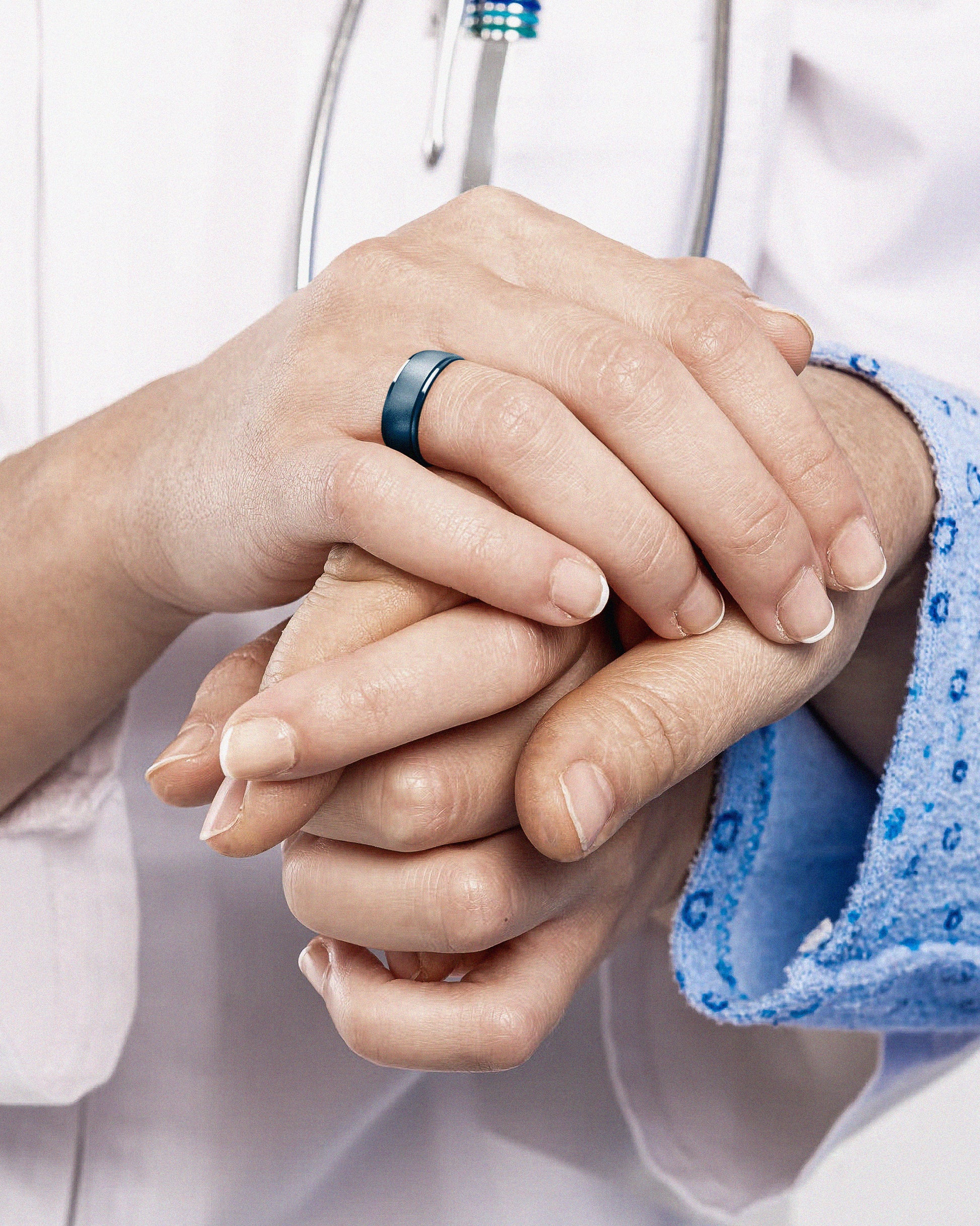 Doctor wearing a blue silicone ring during work