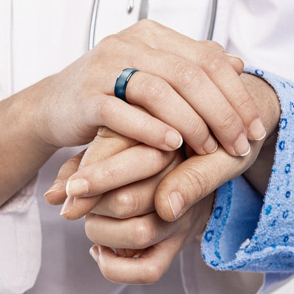 Doctor wearing a blue silicone ring during work